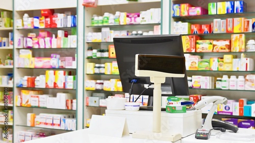 Fotografie Cash desk - computer and monitor in a pharmacy