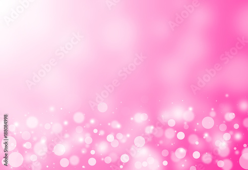 Pink glitter sparkles rays lights bokeh festive elegant abstract background.