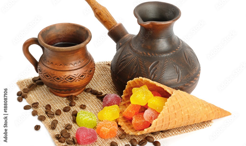 Coffee pot, cup of coffee, jujube and waffles isolated on white background