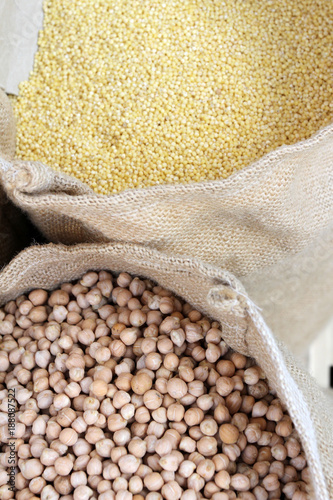 Organic millet in a bag for storage on a farmers market. Millet background, oatmeal 