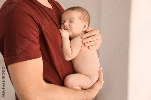 Father with cute little bab...