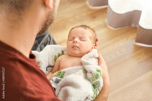 Father with cute little bab...