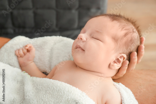 Cute little baby with fathe...