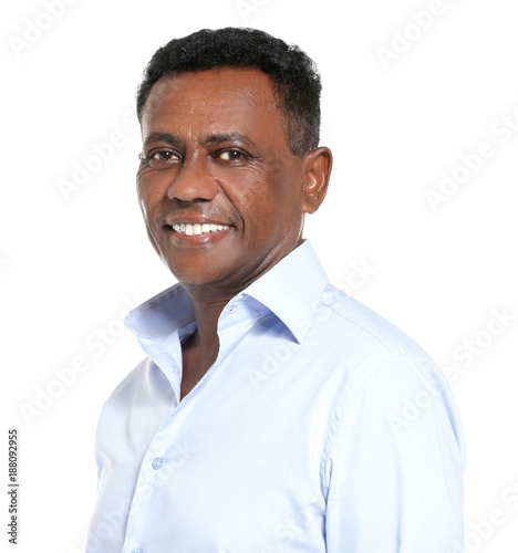 Mature African-American man on white background