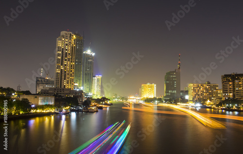 Chao Phraya River Ferris Wheel Trail and night light Bangkok © NONTANUN