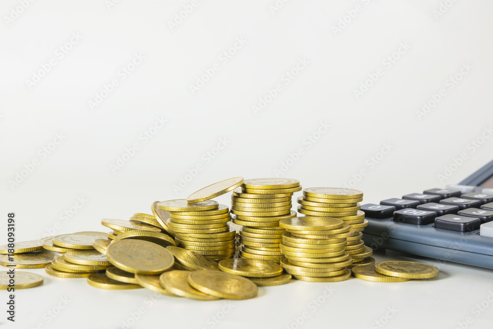 Stock financial indices with stack coin and calculator. Financial stock market in accounting market economy analysis. Stock financial indices with stack coin and calculator. Financial stock market in accounting market economy analysis.