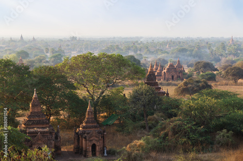 Scenic view of many temples  pagodas and other buildings at the ancient plain of Bagan in Myanmar  Burma   in the morning.