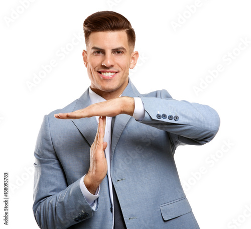 Handsome manager showing ti...