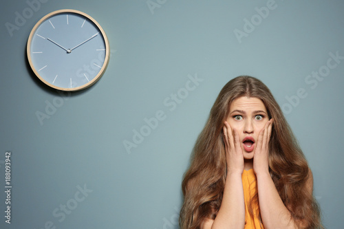 Shocked manager near wall w...