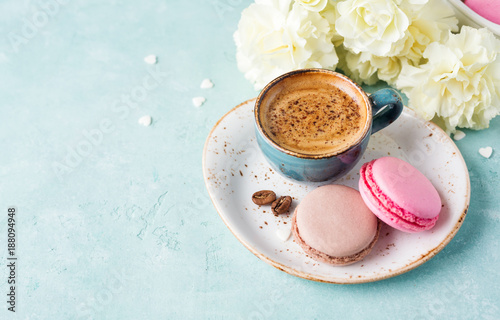 Vászonkép Cup of coffee and macaroons.