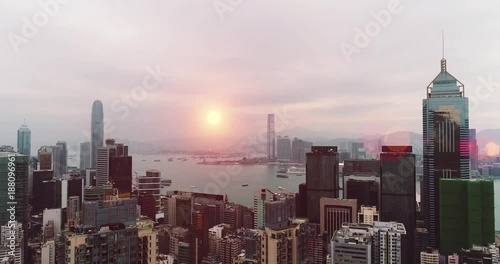 AERIAL. Hong Kong Sunrise, View from The drone, Hong Kong Sun shape in the sky photo