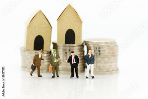 Miniature people: Group business meeting guaranteed loan, third party, guarantor. Image use for business concept.