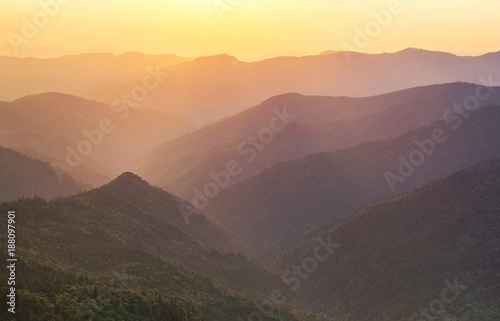 Mountain ridge during sunrise. Beautiful natural panoramic landscape in the summer time © biletskiyevgeniy.com