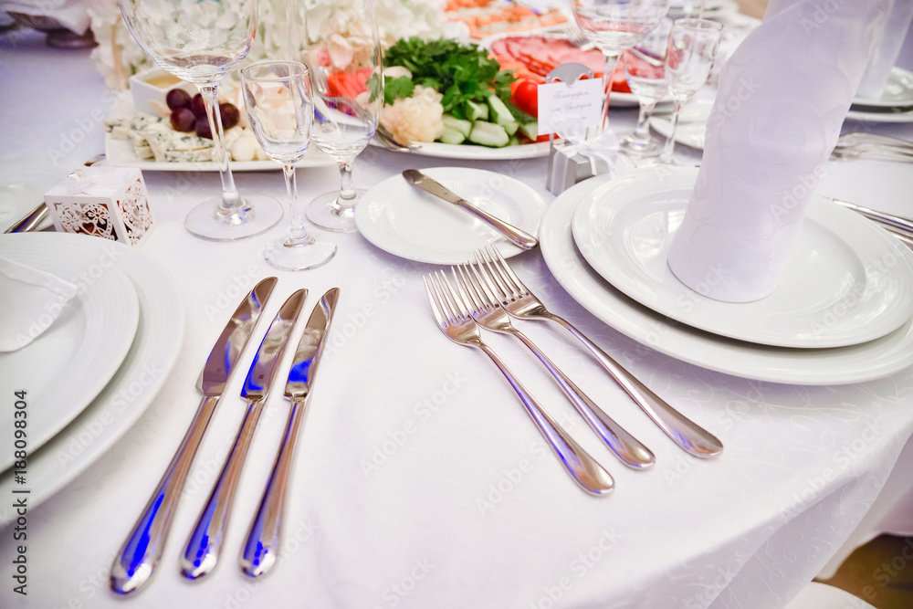 Knives and forks on the table, table laying Knives and forks on the table, table laying