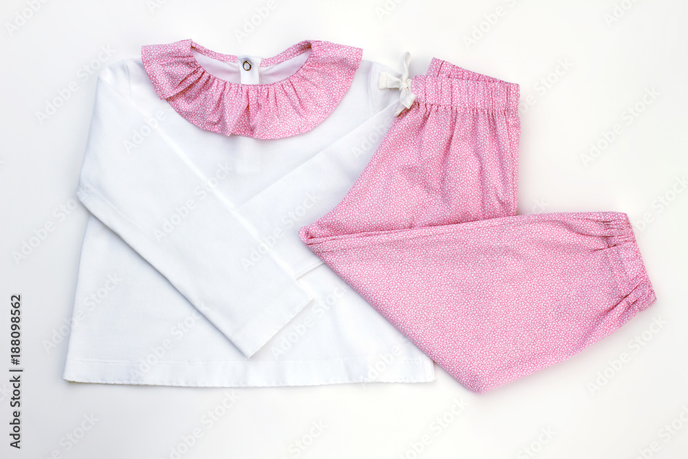 New pajama for lovely daughter. White and pink, simple fine pattern. Comfortable clothes for good night. New pajama for lovely daughter. White and pink, simple fine pattern. Comfortable clothes for good night.