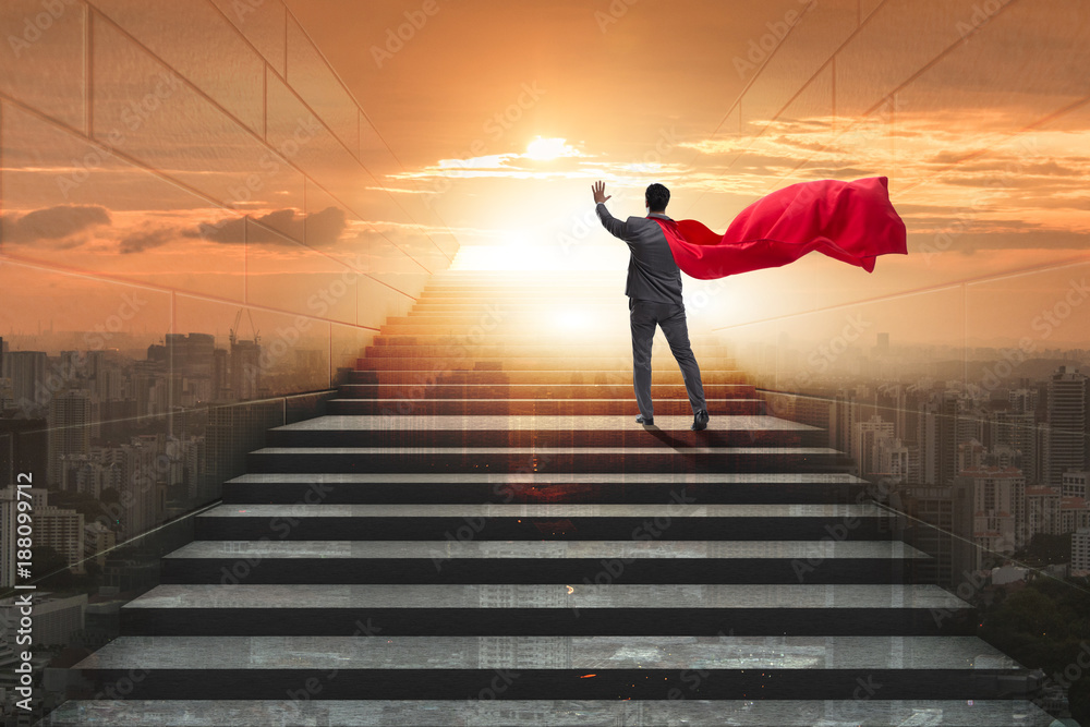Businessman superhero pressing virtual buttons on career ladder