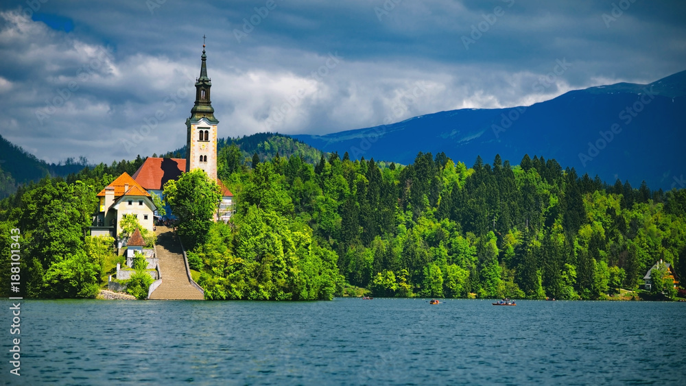 Bled Lake with church and mountains in background