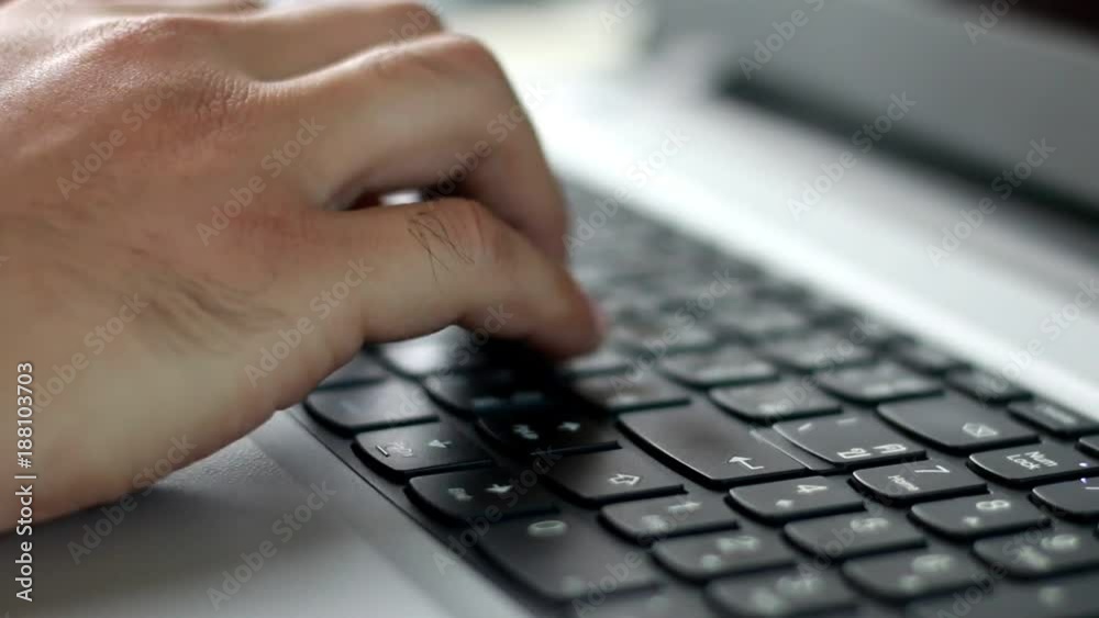 Close up hand worker typing on laptop keyboard Close up hand worker typing on laptop keyboard