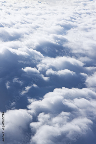 Fototapeta Naklejka Na Ścianę i Meble -  Clouds seen from an airplane window
