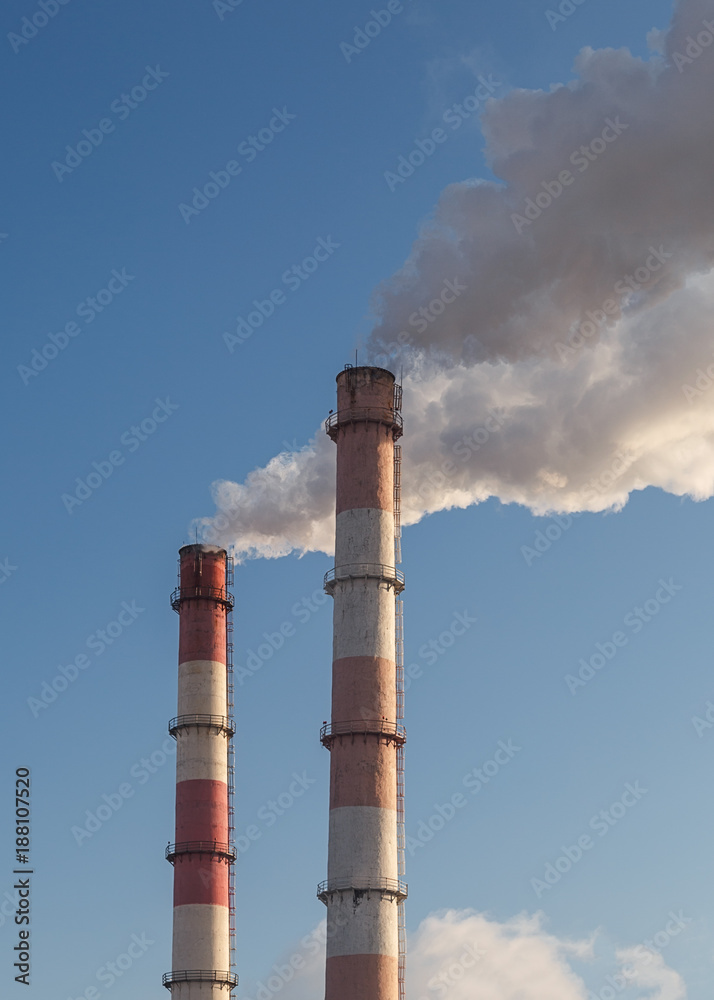 Smoke from the pipes. Heating of houses, pollution of the environment and nature Smoke from the pipes. Heating of houses, pollution of the environment and nature