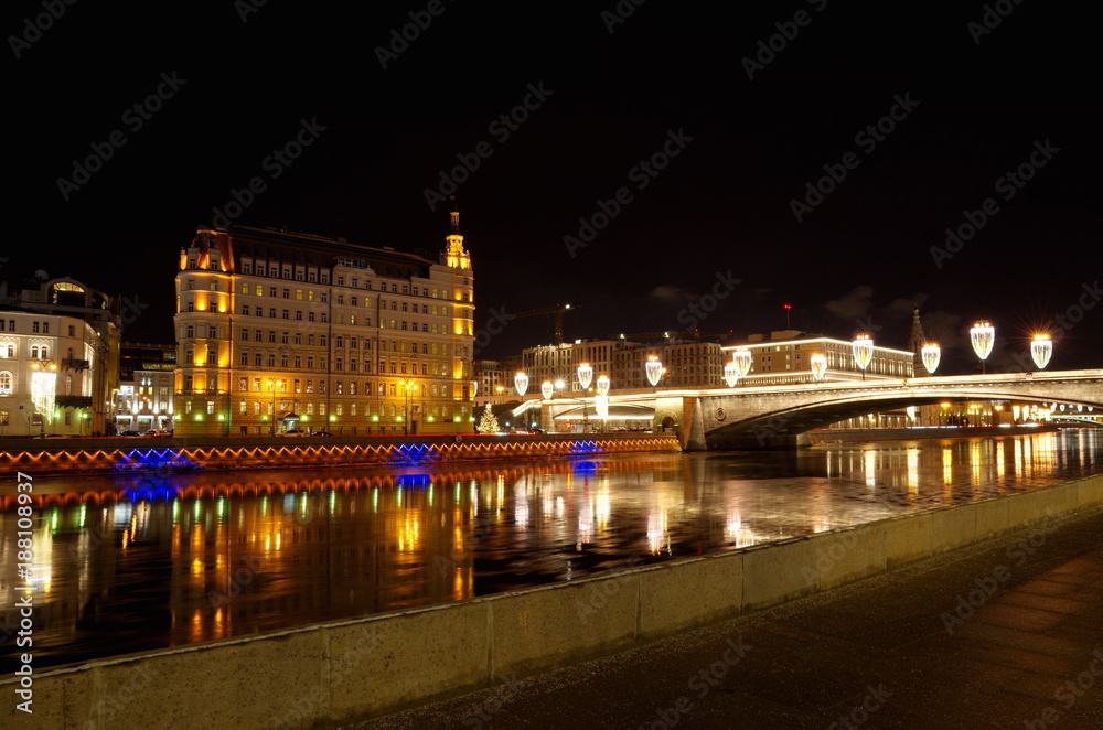 Festive illumination on Raushskaya embankment and Big Moskvoretsky bridge, Moscow, Russia