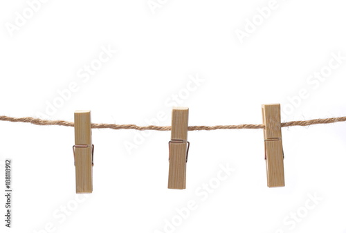 wooden clothespins, bamboo peg on rope isolated on white background, clipping path 