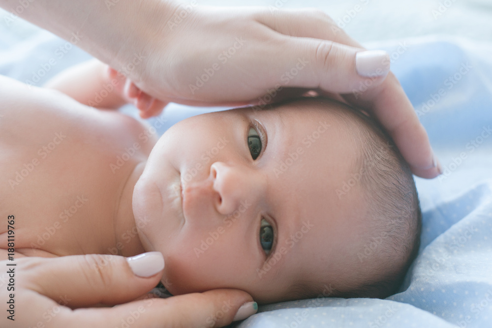 mother loves and cares for her newborn baby. family values. adorable baby child. mother loves and cares for her newborn baby. family values. adorable baby child.