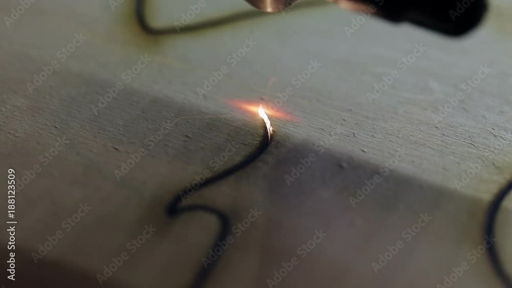 Laser Cutting Machine At Work. Plywood Cutting. Close-up Laser Cutting Machine At Work. Plywood Cutting. Close-up