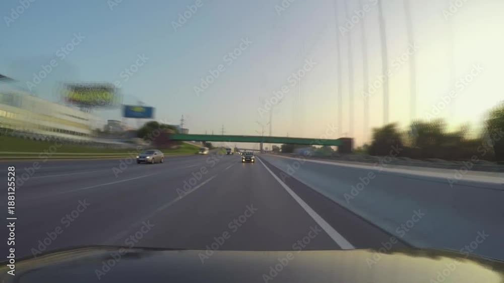 The car rides on the highway. Rear view. Time lapse footage The car rides on the highway. Rear view. Time lapse footage