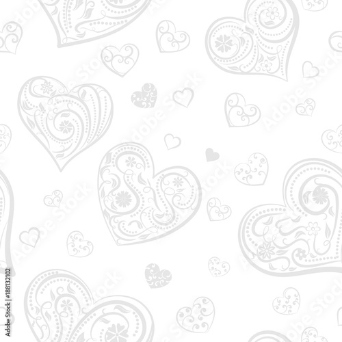 Seamless pattern of big and small hearts with ornament of curls, flowers and leaves, gray on white