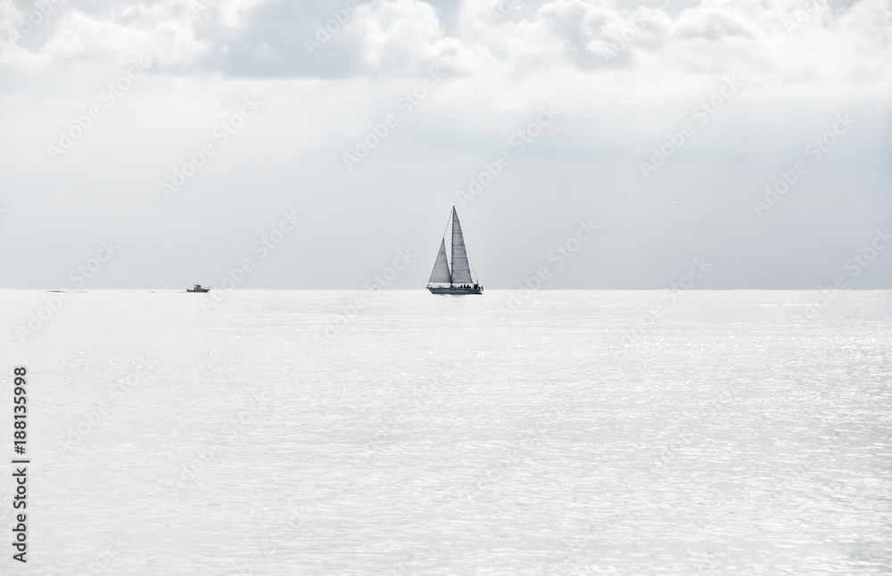 Boats on the horizon line - high key - Ligurian sea