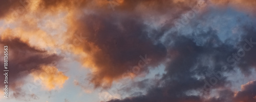 Panorama of Sky background or texture at the sunset time with clouds. Copy space. Instagram