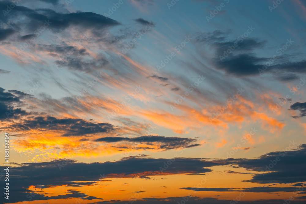 Beautiful colorful clouds with evening sunset in the background