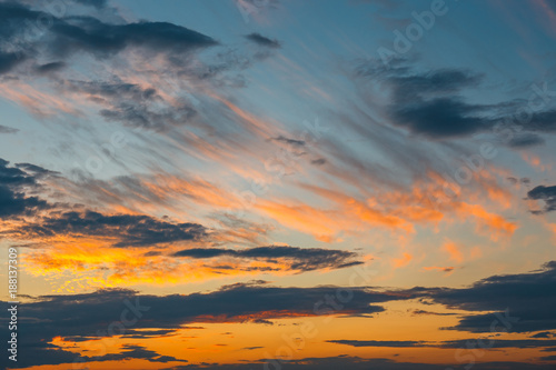 Beautiful colorful clouds with evening sunset in the background