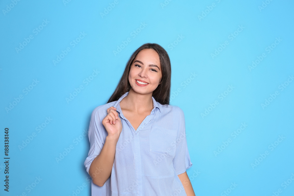 Beautiful smiling woman on color background Beautiful smiling woman on color background
