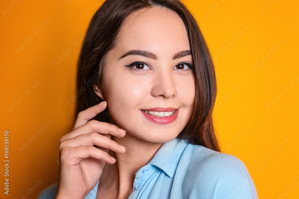 Beautiful smiling woman on color background Beautiful smiling woman on color background