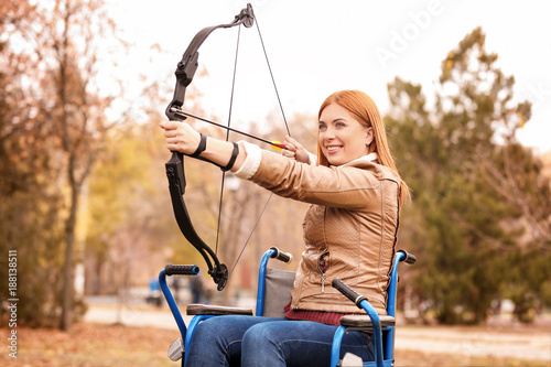Young woman in wheelchair p...