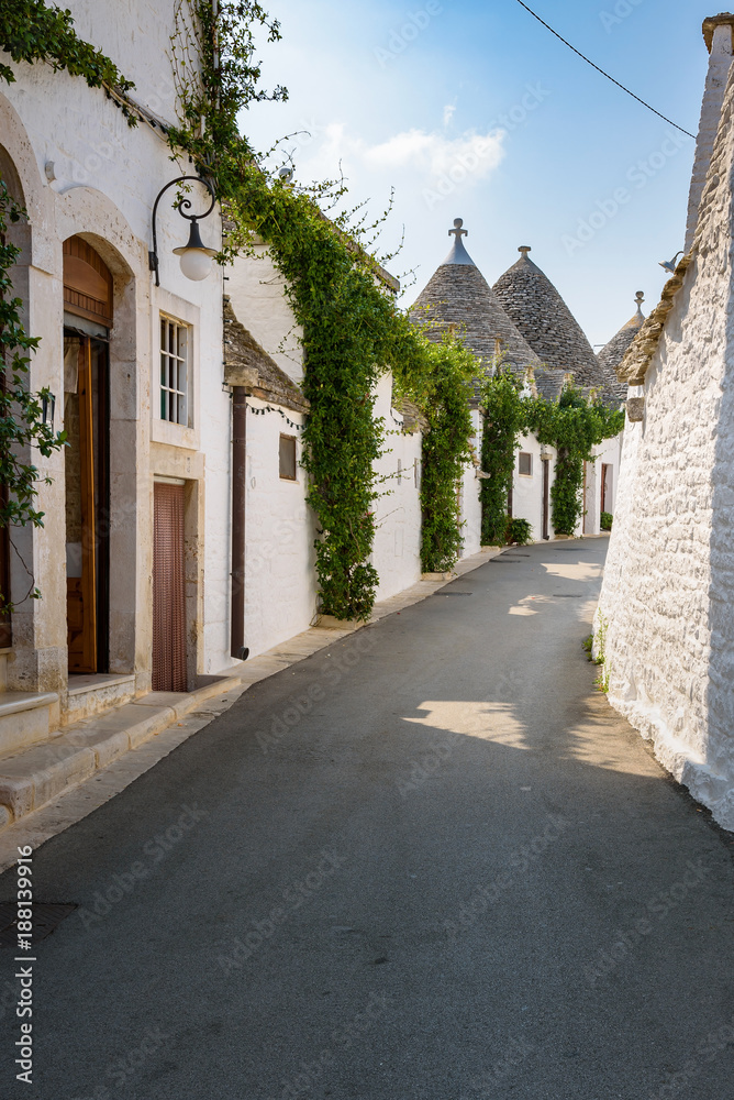 Narrow street in Alberobello town