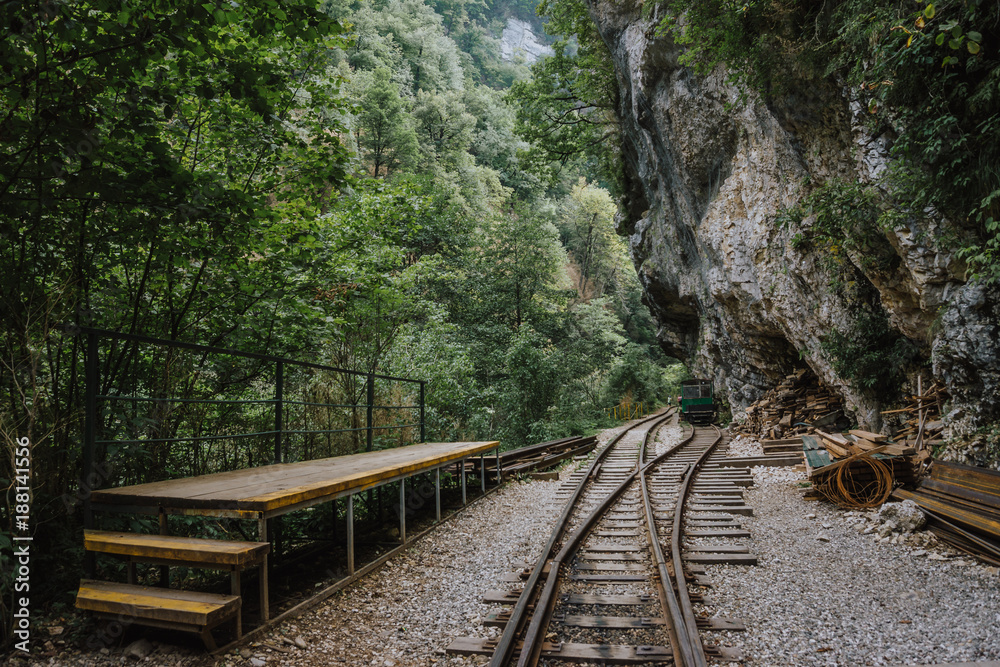 Fototapeta premium Old railroad or railway road in mountain landscape