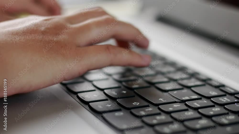 Close up hand worker typing on laptop keyboard Close up hand worker typing on laptop keyboard