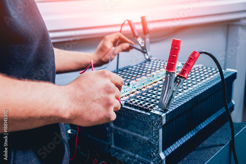 Charging the batteries of the elecric motor. Disassembling the battery of an electric vehicle engine