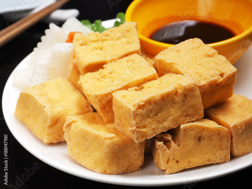 Deep fried tofu with sweet and soy sauce