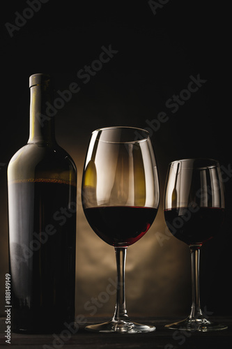 Bottles of Red Wine and Glasses