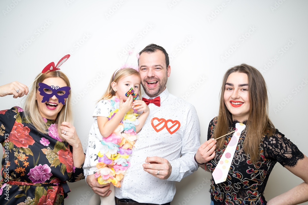 photo booth family dad mom daughter baby girl pose plain white background studio