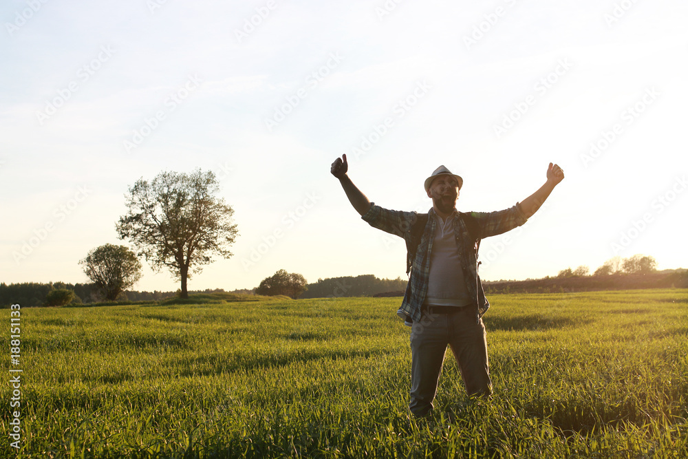 Man in casual clothes is a traveler in the open spaces Man in casual clothes is a traveler in the open spaces