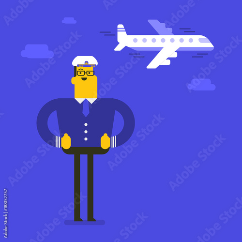 Young smiling caucasian white airline pilot standing on the background of an airplane flying in the sky