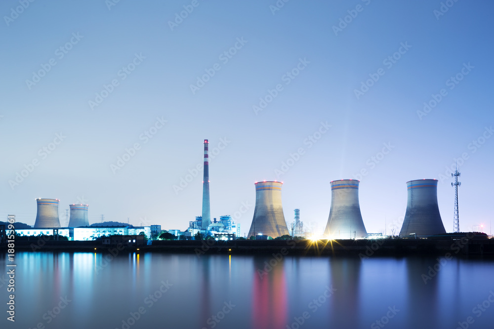 power plant near water at twilight power plant near water at twilight
