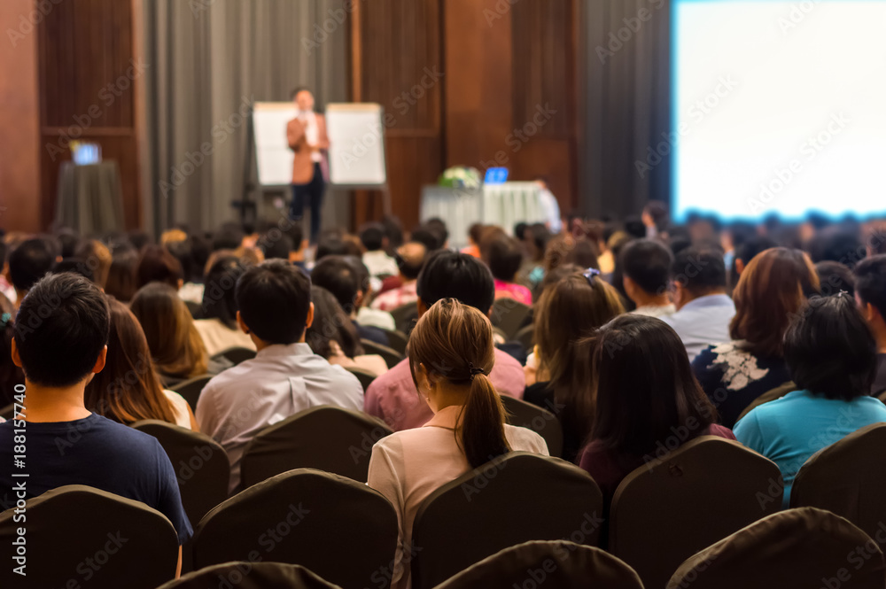 Abstract blurred photo of conference hall or seminar room with attendee background Abstract blurred photo of conference hall or seminar room with attendee background
