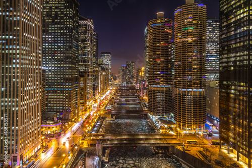 Chicago night skyline river and buildings