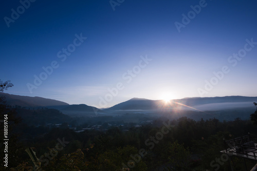The sun is rising in the mountains in morning   © sakdinon
